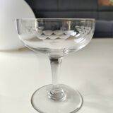 Set of 6 Baccarat-style champagne glasses. Stylized grape cluster decoration.