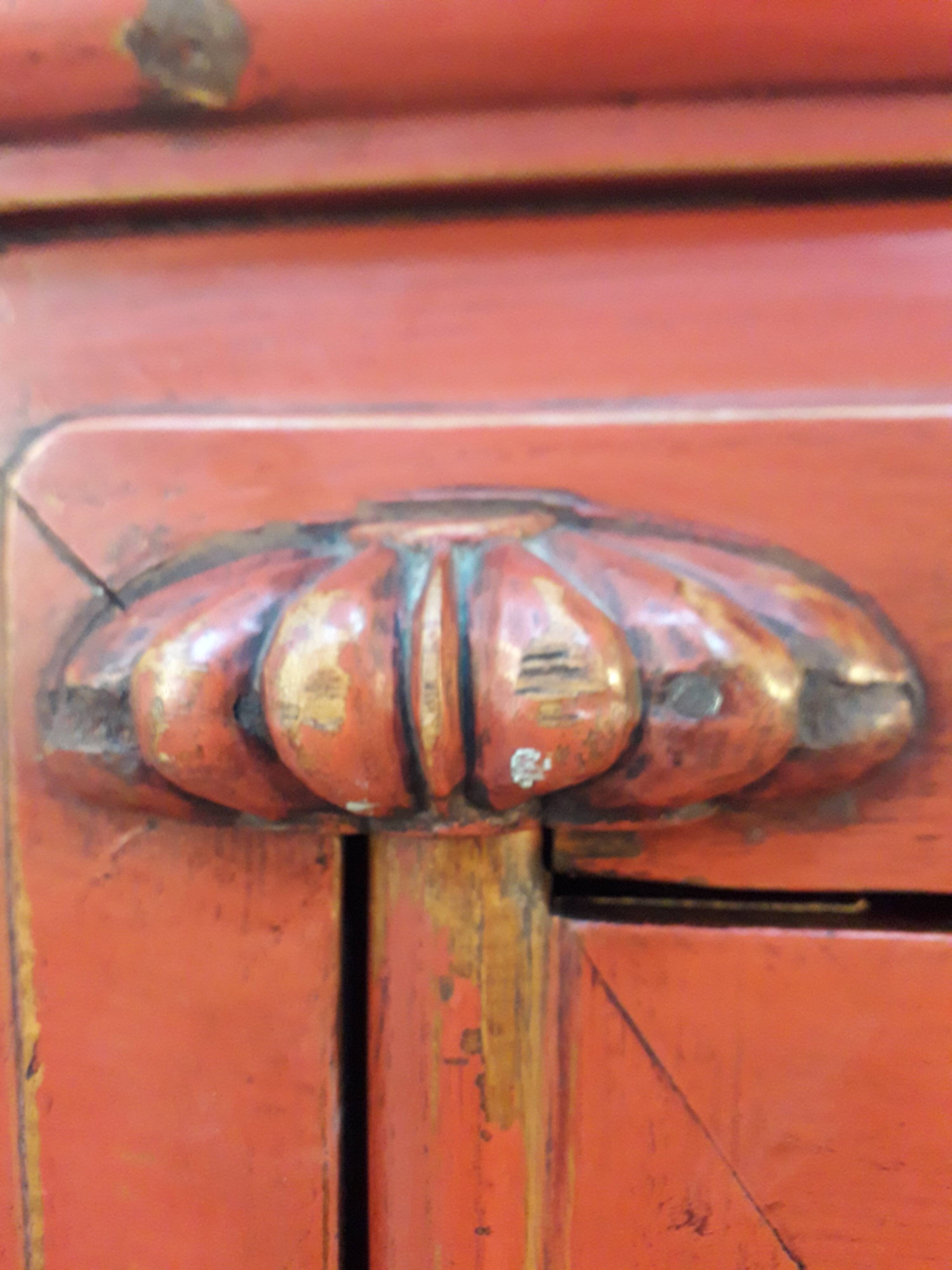 Chinese wardrobe in red lasca