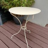 Old white iron garden table