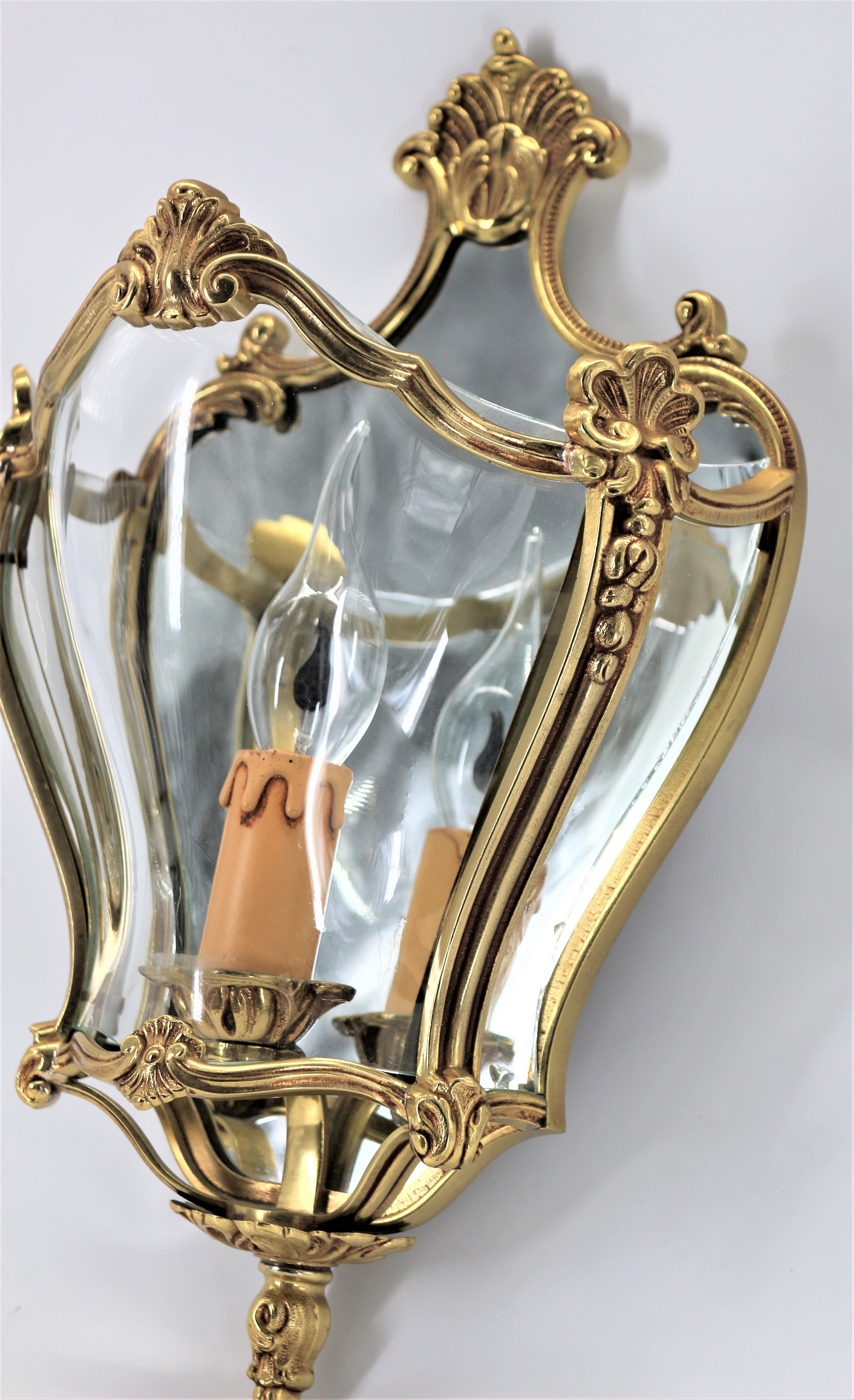 Pair of Louis XV style appliques in solid bronze & curved glass