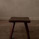 Vintage wooden stool in organic shape