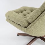 Green swivel Scandinavian armchair