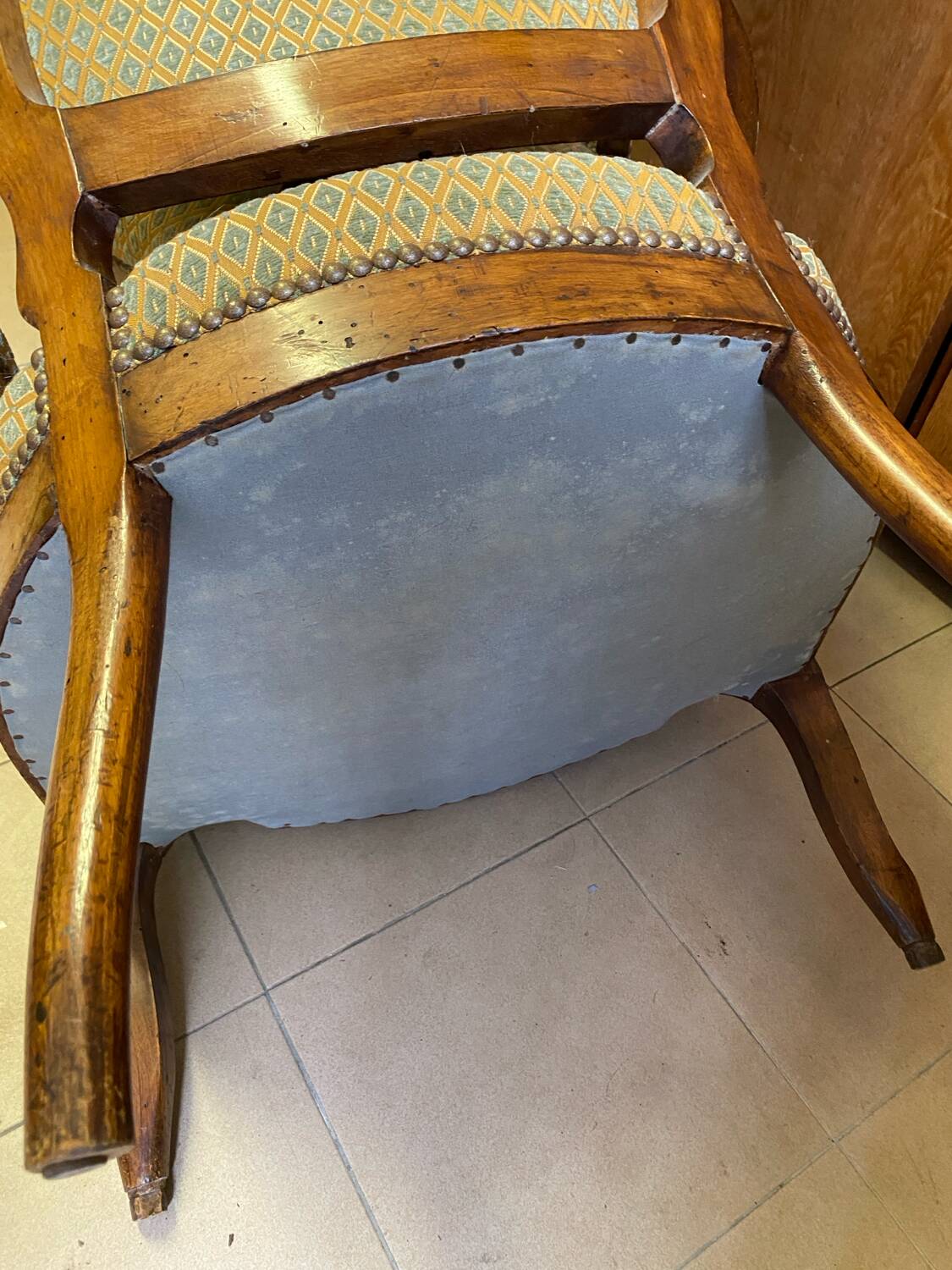 Two Louis XV style wooden and fabric armchairs