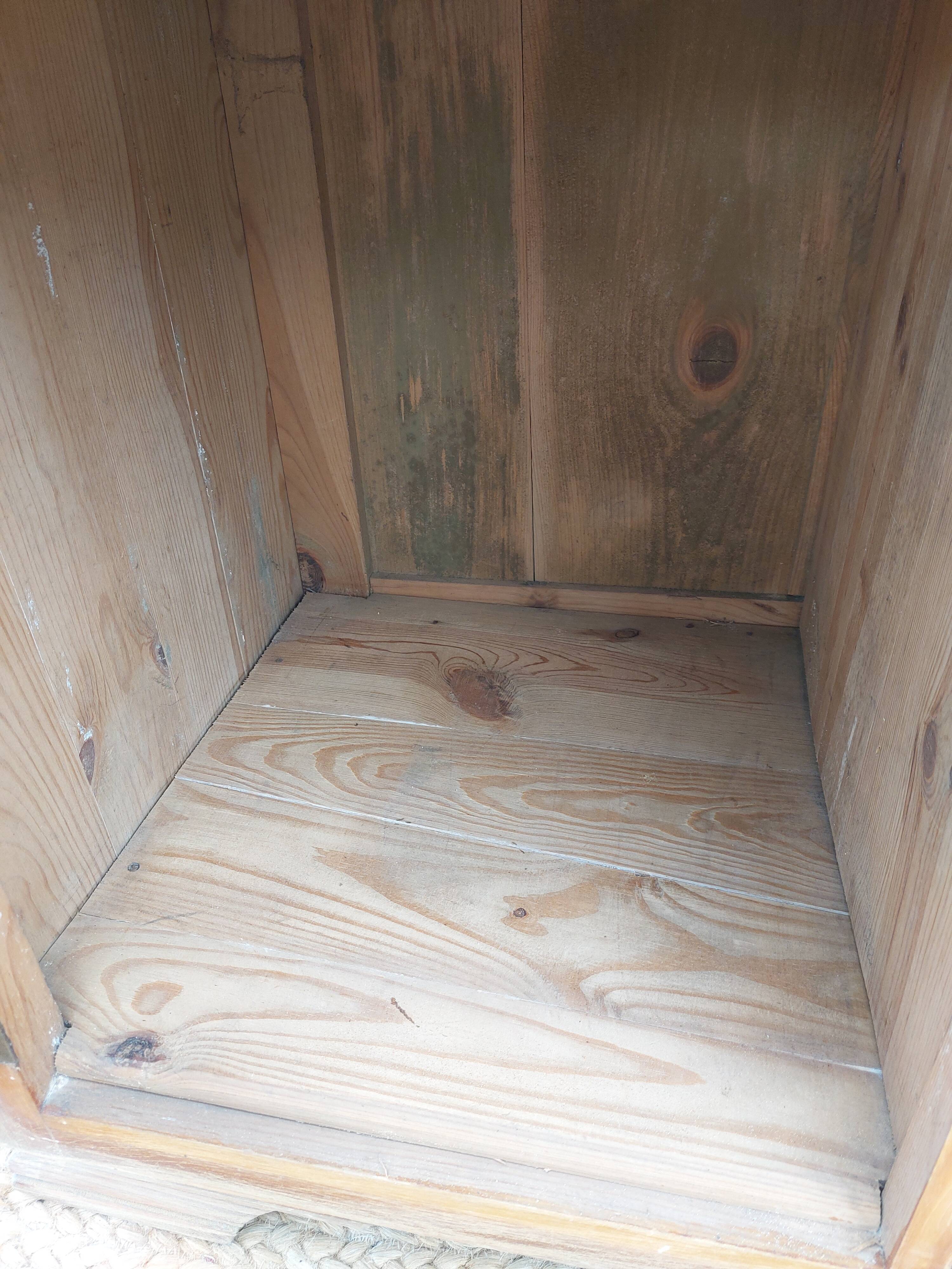 Vintage wooden buffet with a marble top.