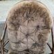 Fauteuil pivotant en rotin et coussin velours marron années 70