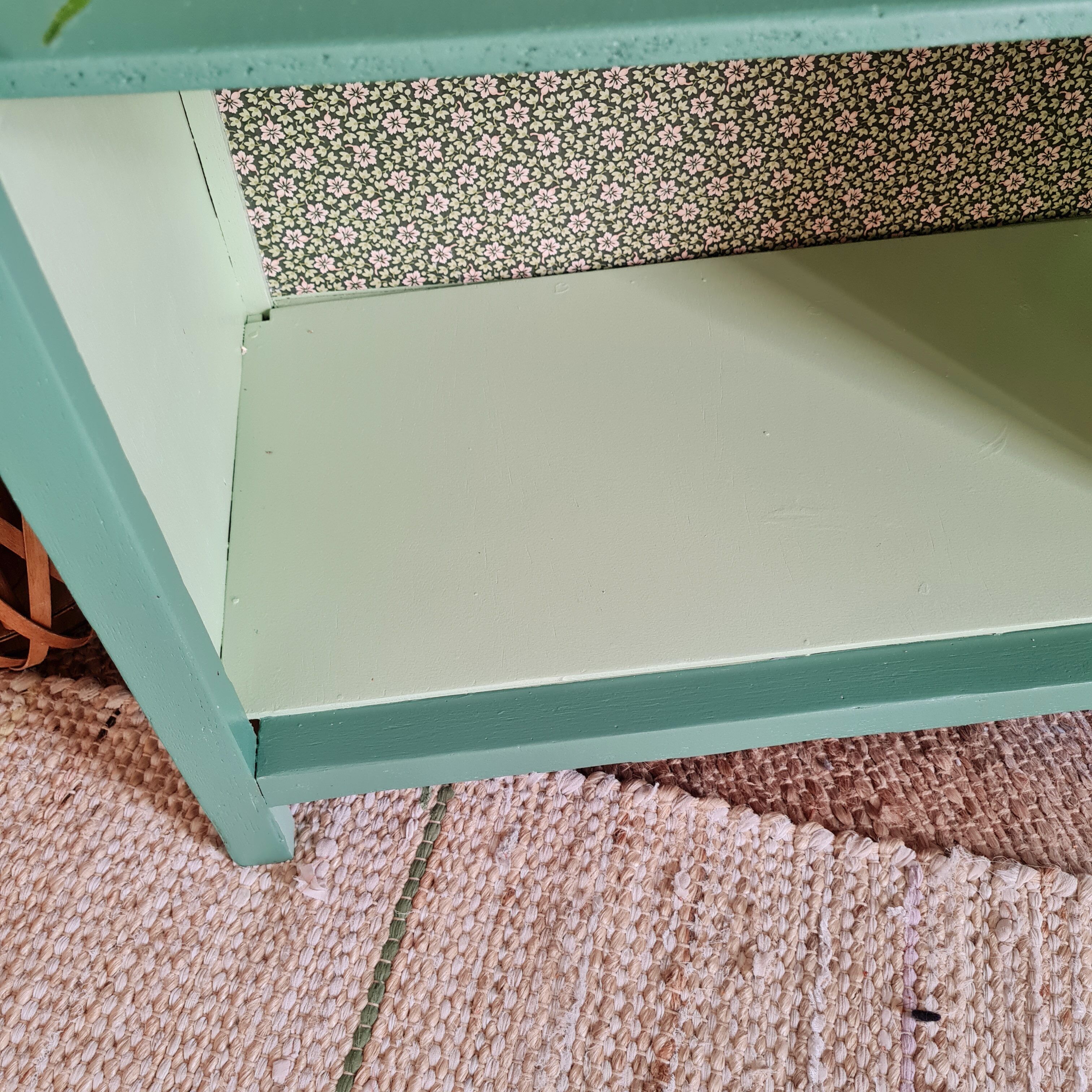 Renovated library shelf green color and floral atmosphere