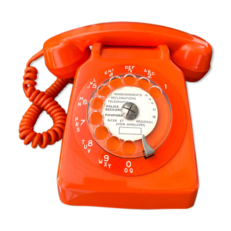 Orange vintage dial phone