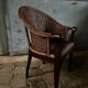 4 fauteuils en rotin foncé