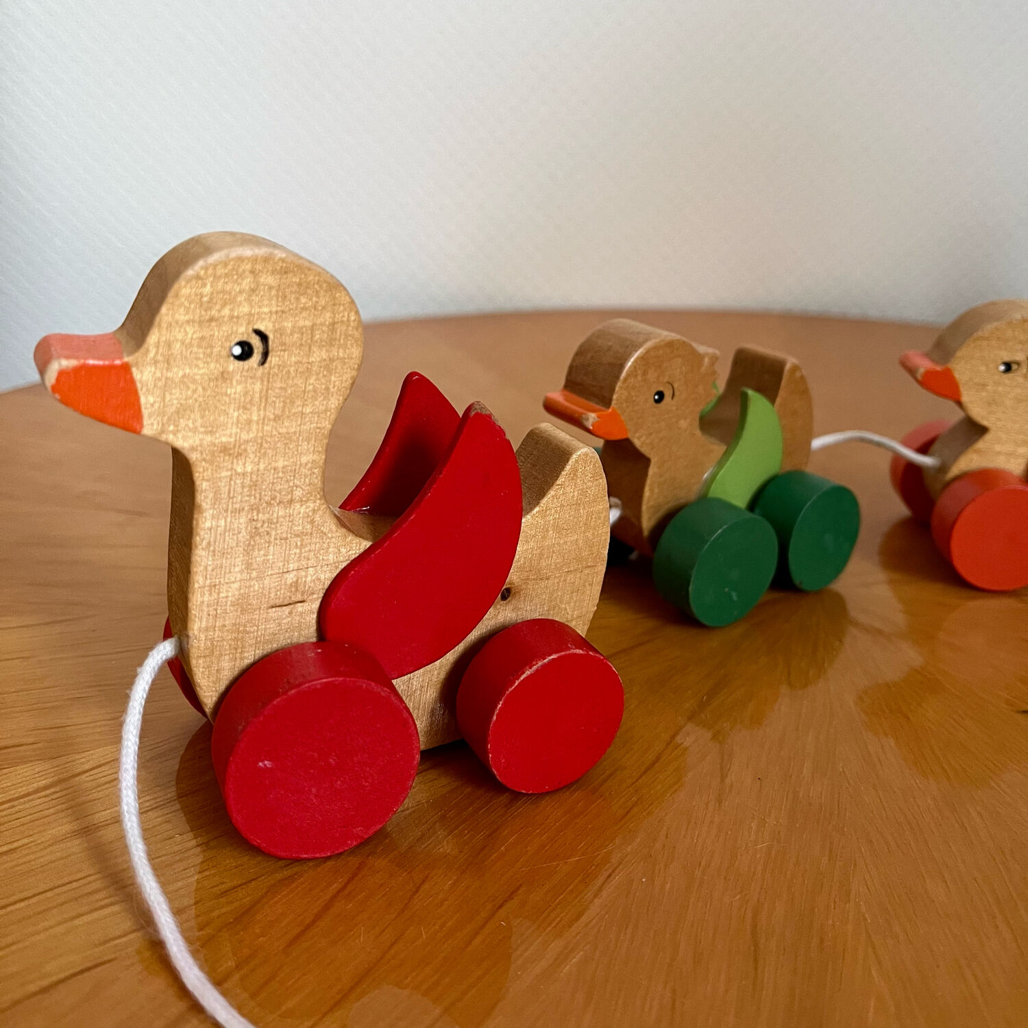 Old vintage wooden duck toy to pull