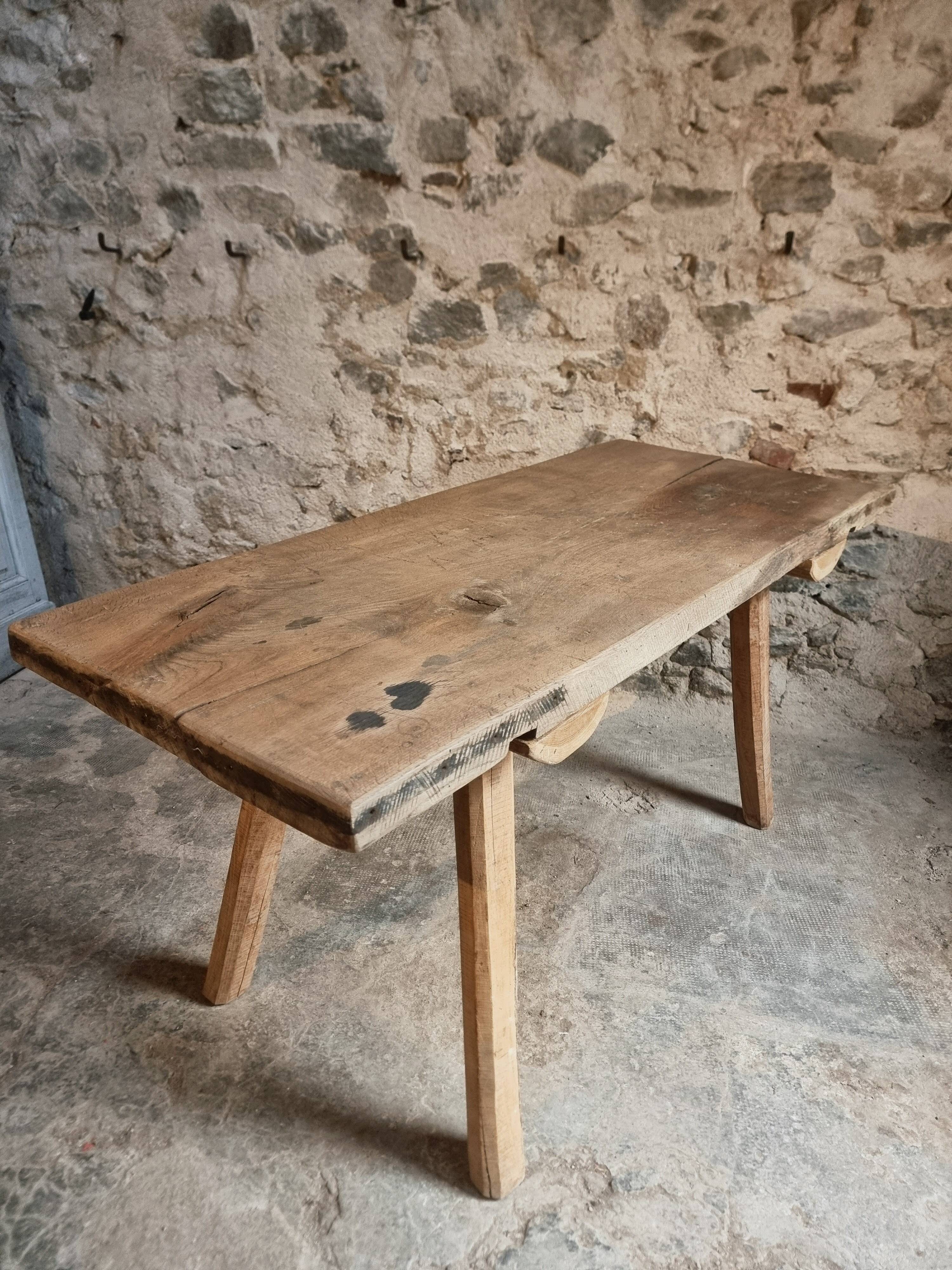Antique work table / primitive dining table in oak, Hungary, circa 1900–1930.