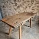 Antique work table / primitive dining table in oak, Hungary, circa 1900–1930.