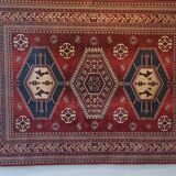 Wall rug with oriental patterns.