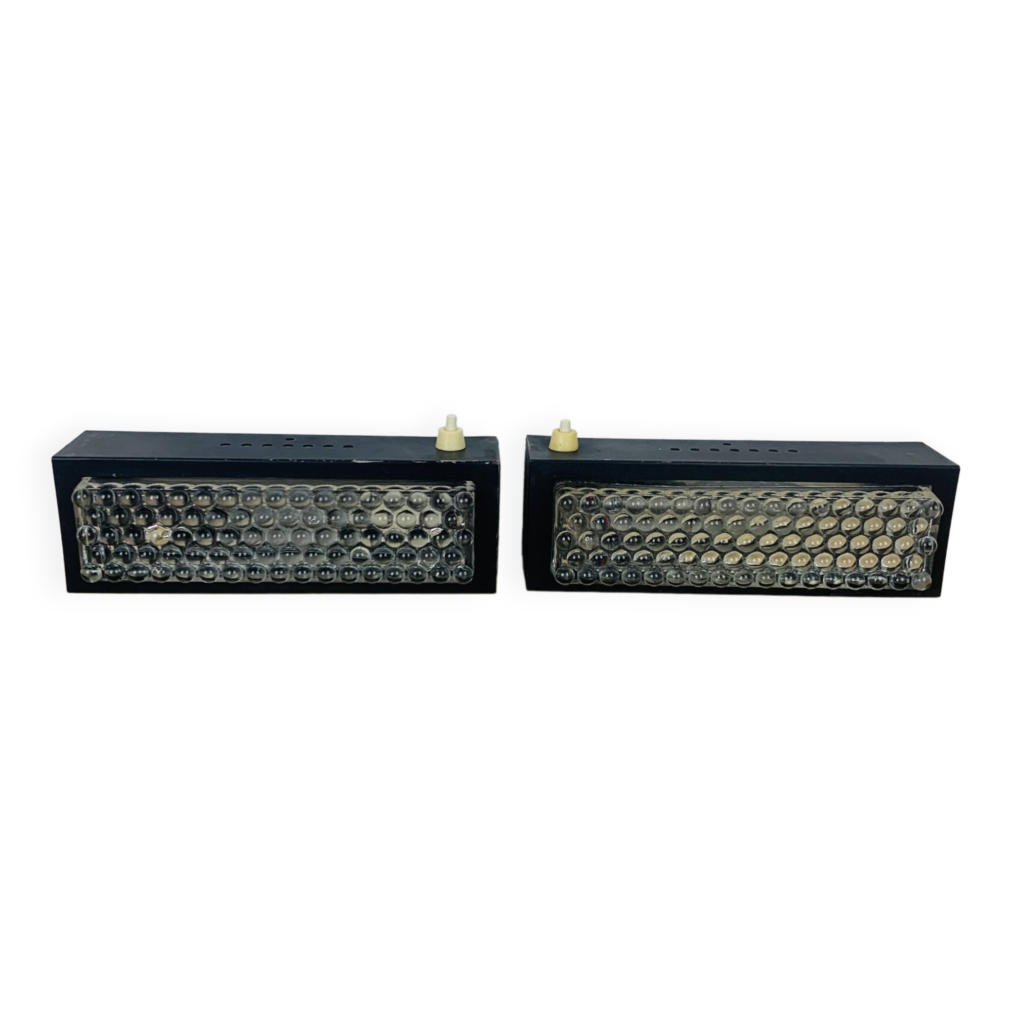 Pair of molded glass and metal wall lights from the 1950s