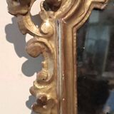 Ancienne paire de miroirs en bois sculpté et doré