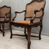 Pair of armchairs with cane bottom of epoch regence xviiieme