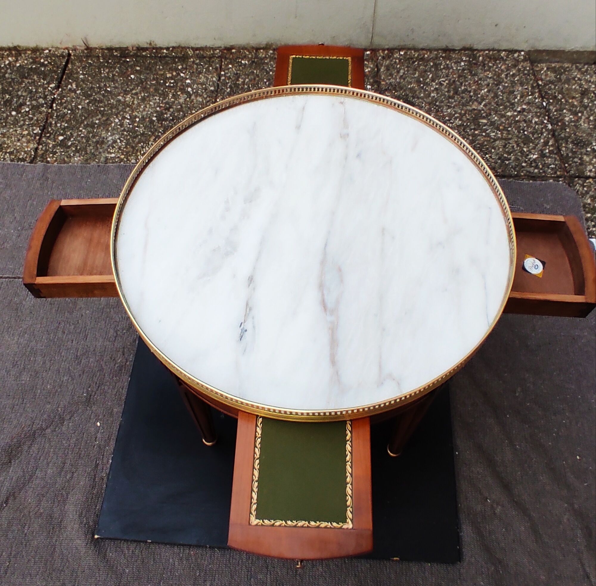 French hot water bottle table in Louis XVI style (1890); marble top and bronze gallery