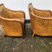 2 colonial armchairs in wood, rattan and leather, 1950s