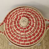 Red and beige woven basket with lid