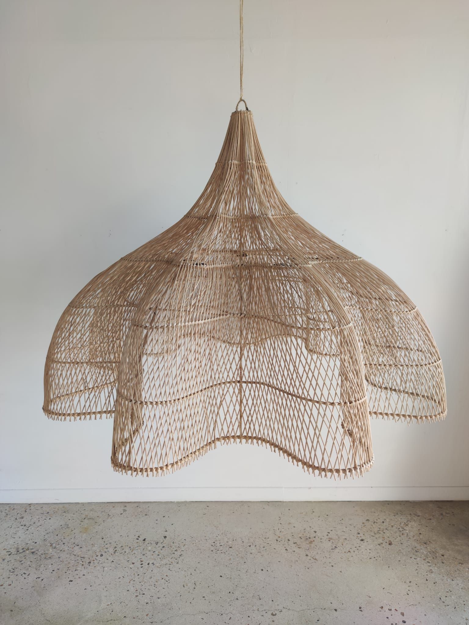 Huge rattan suspension in the shape of a corolla H:1m; D: 1m50