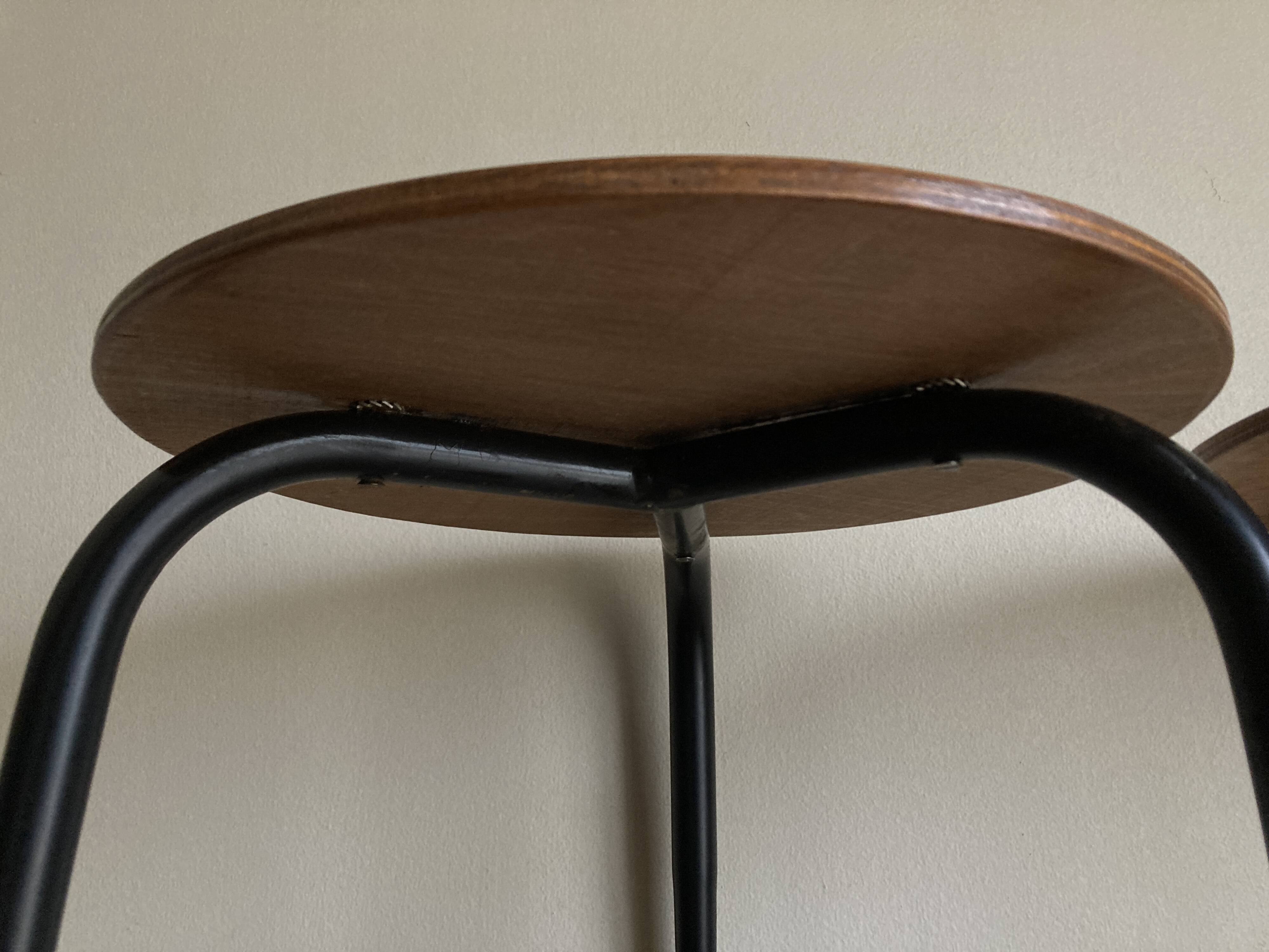 Pair of mid-century modernist plywood bedside stools, 1960s
