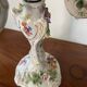 Pair of candelabra with 4 light sources in porcelain. Late 19th century.