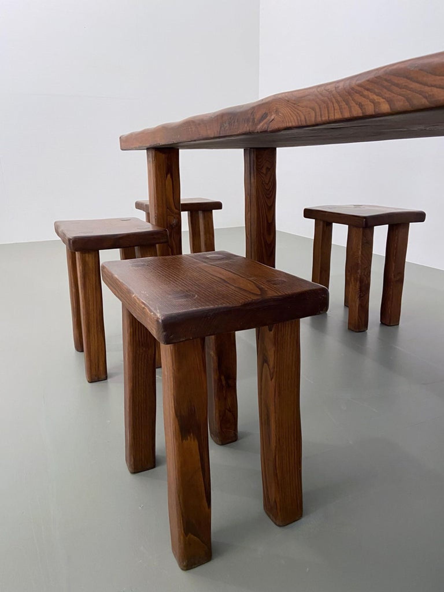 Solid elm dining set including 6 stools France 1970s