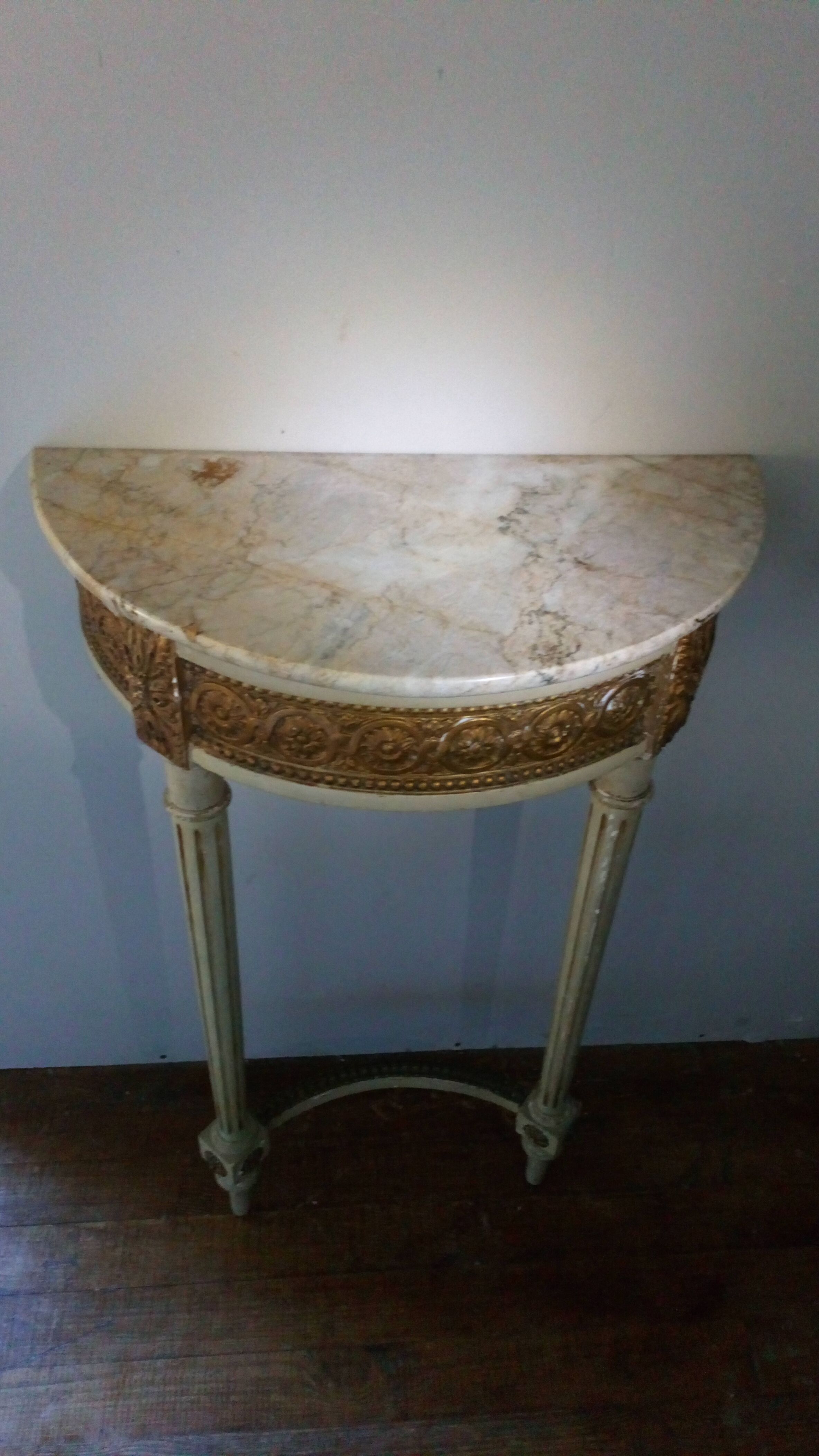 Golden and gray console