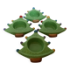 Four Christmas tree-shaped candle holders