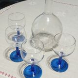 Old carafe and its wine glasses