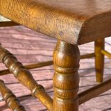 Wooden armchair with high back