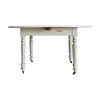 Old oval wooden table white top and turned legs