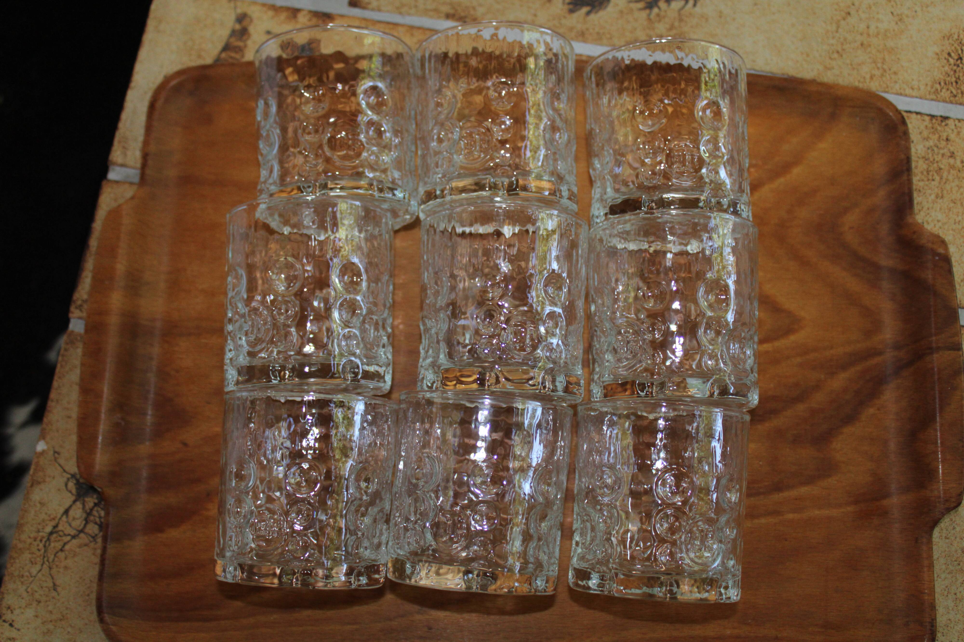 Set of 11 advertising glasses BP 70's