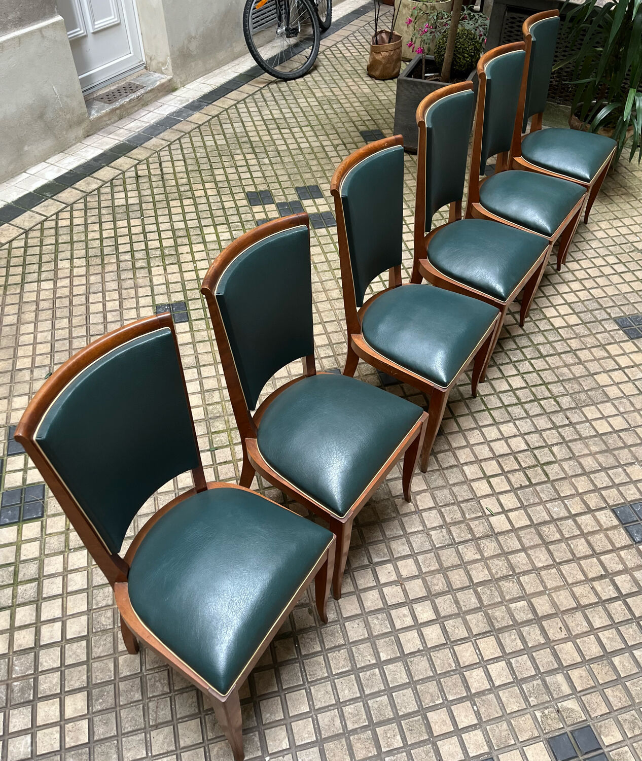 Green art deco chairs in skaï and wood
