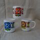 3 mugs mobil grosses fleurs Arcopal pub bleu  orange  ocre collection vintage