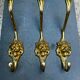 3 lion coat hooks in brass Art Nouveau
