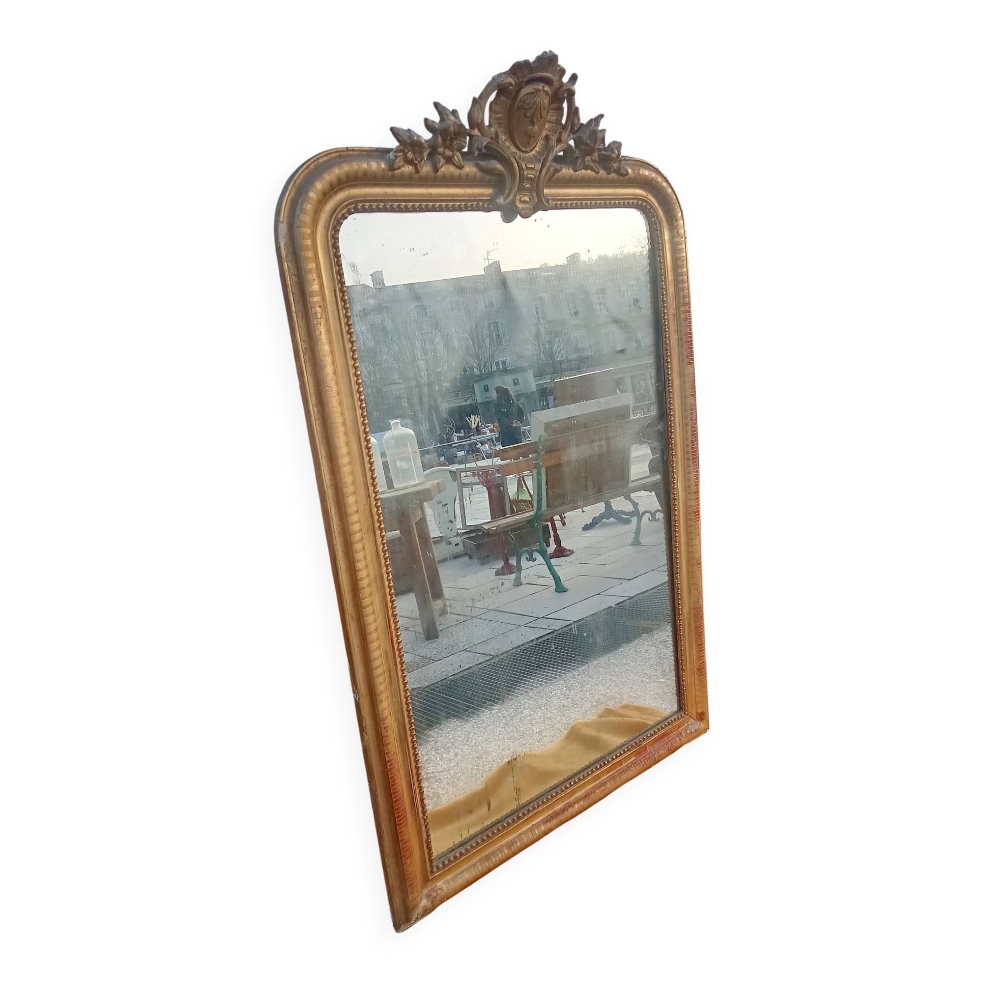 Antique Louis Philippe mirror gilded with gold leaf.