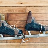 Pair of vintage lutra ice skates