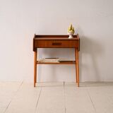 Bedside table with rattan magazine rack