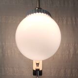Opaline glass globe wall sconce with a gilt metal bracket - mid-20th century