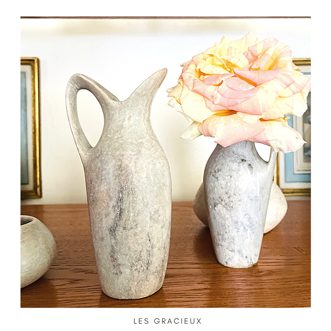 2 jugs in rough cut stone