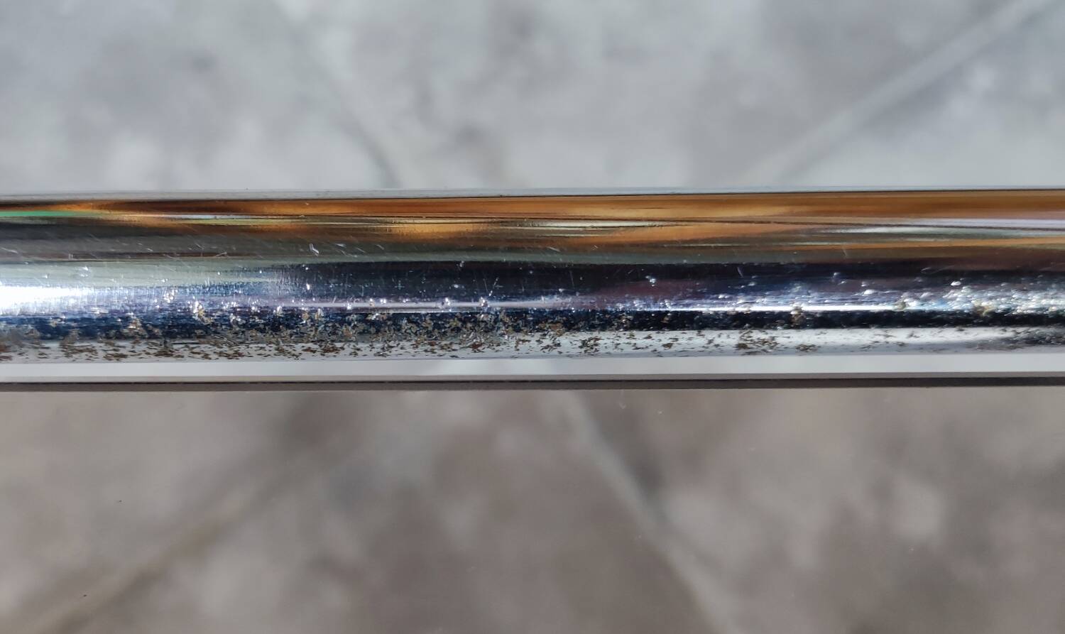 Small designer coffee table in gold metal