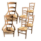 Chairs and armchairs in solid oak - seat in straw