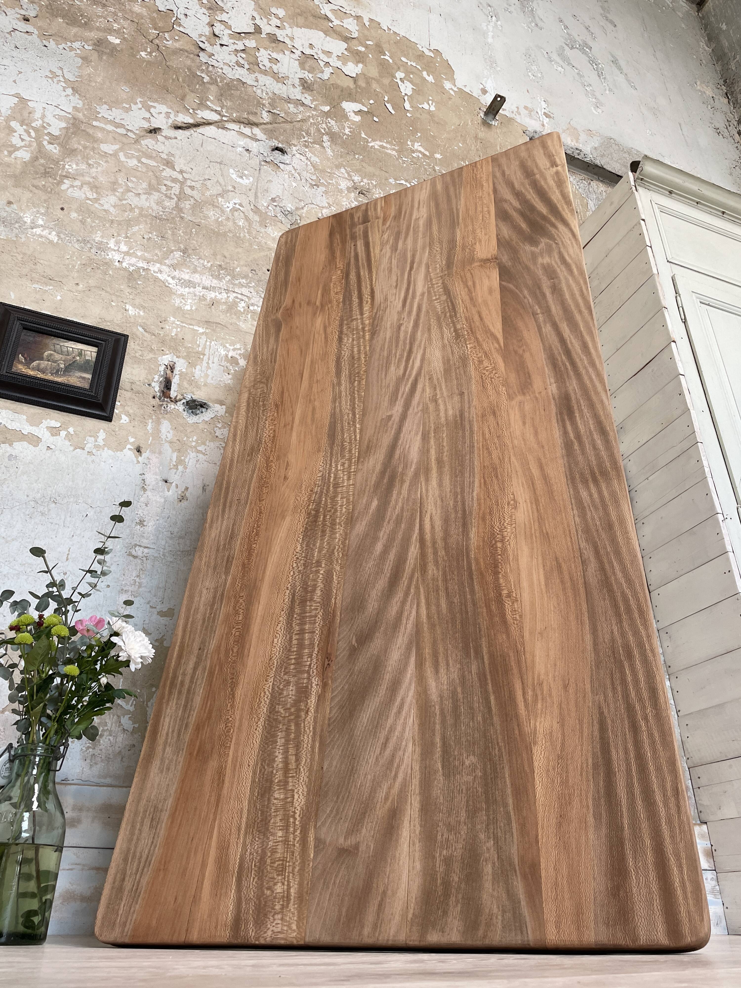 Vintage farmhouse table with turned legs.