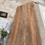 Vintage farmhouse table with turned legs.