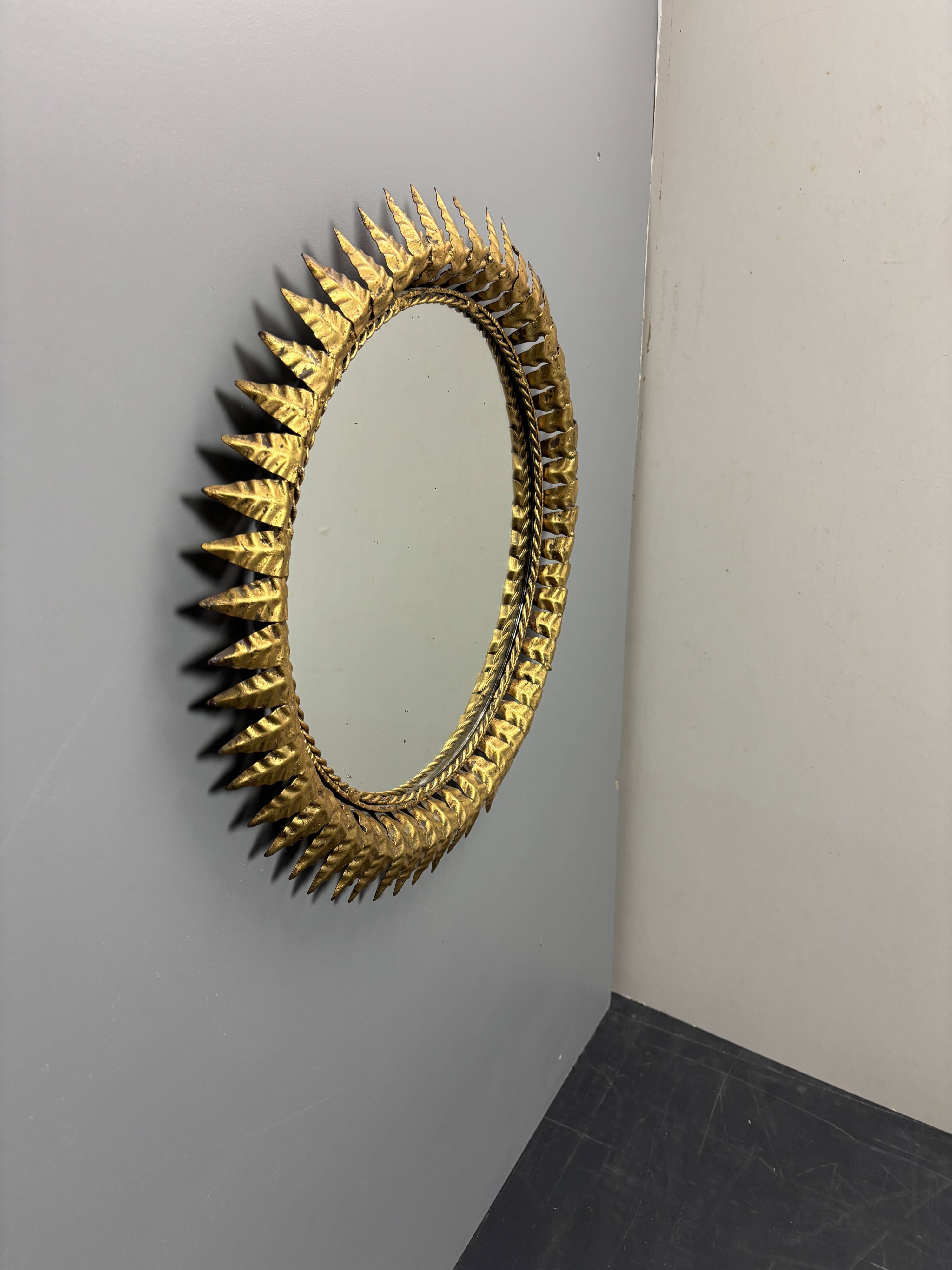 Midcentury bohemian Hollywood Regency Spanish gilt metal sun mirror, 1960s