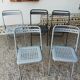 Set of five folding chairs