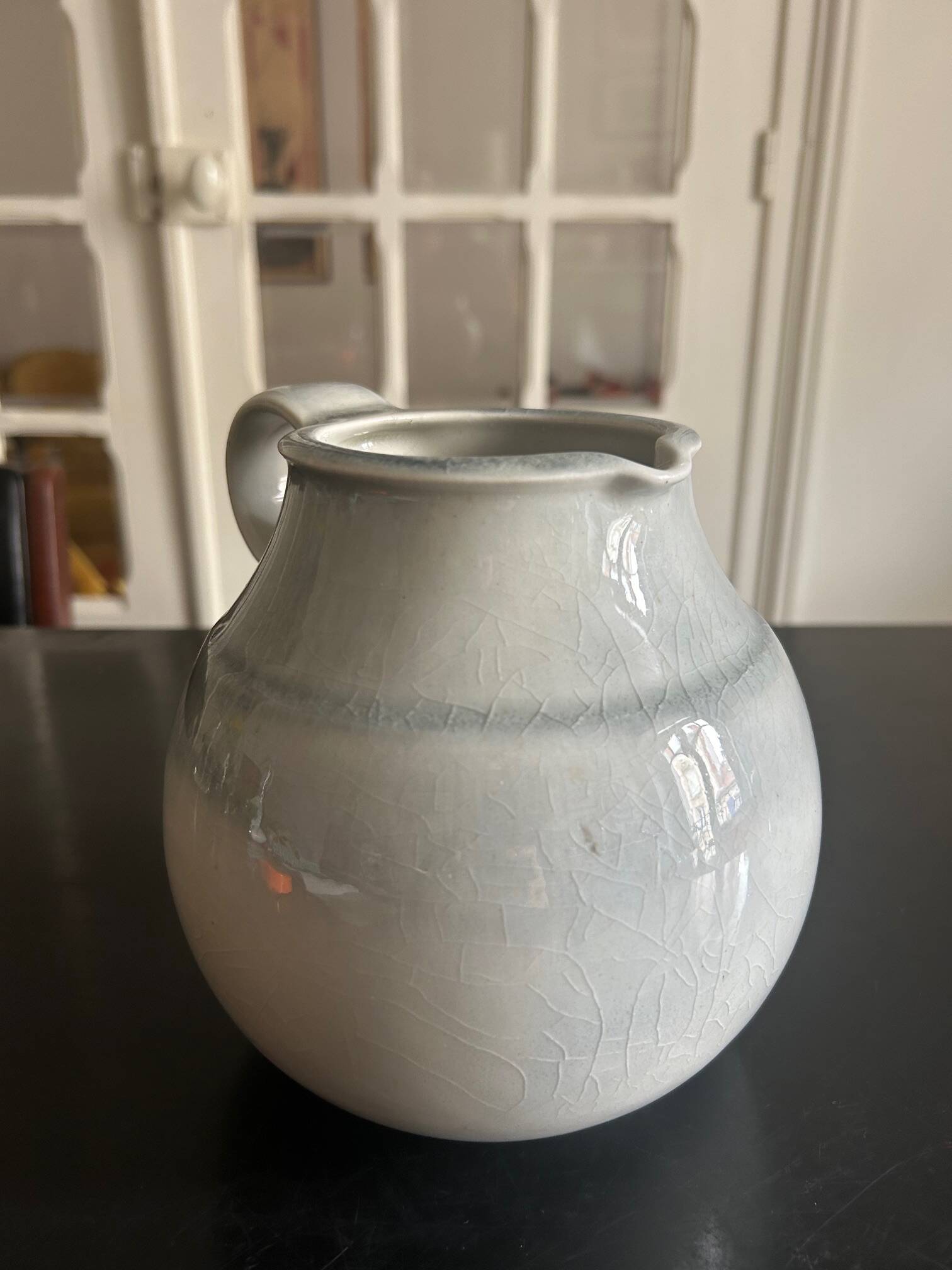 large blue ceramic pitcher