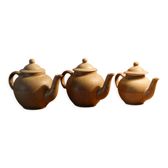 Set of 3 sandstone teapots