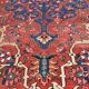 Ancient Persian carpet made of hand-woven wool. Very good condition.