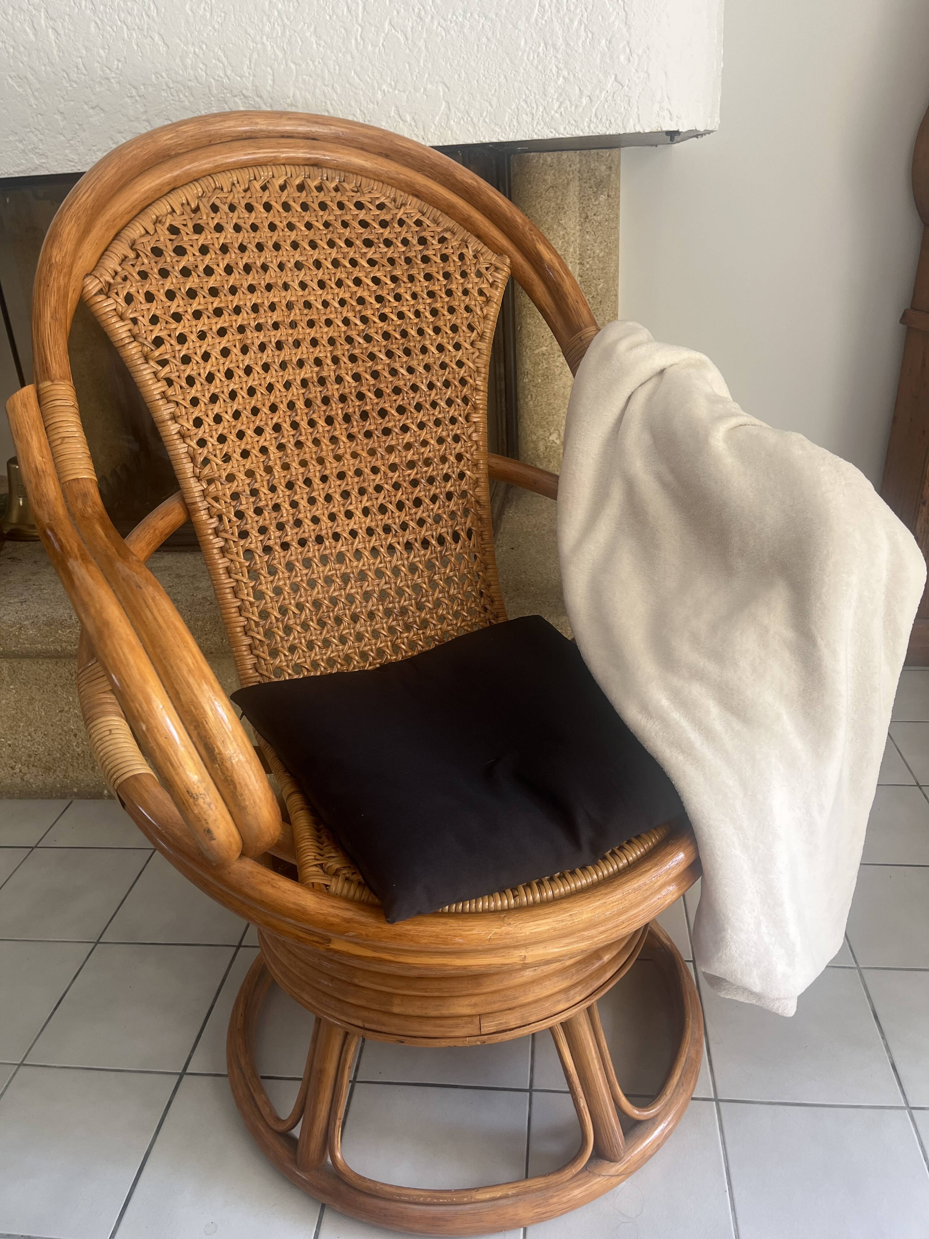 Vintage rattan and cane swivel armchair (1970s/80s) -